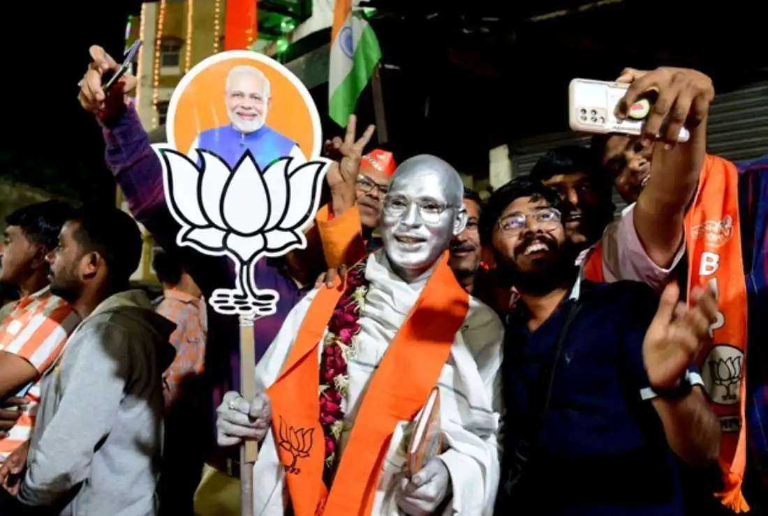 Supporters of India's ruling Bharatiya Janata Party cheer for Prime Minister Narendra Modi after a landslide in his home state Gujarat during a victory rally in Ahmedabad on Dec. 8, 2022