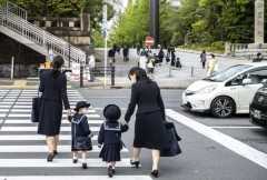 Do childless adults in Japan face parental harassment?