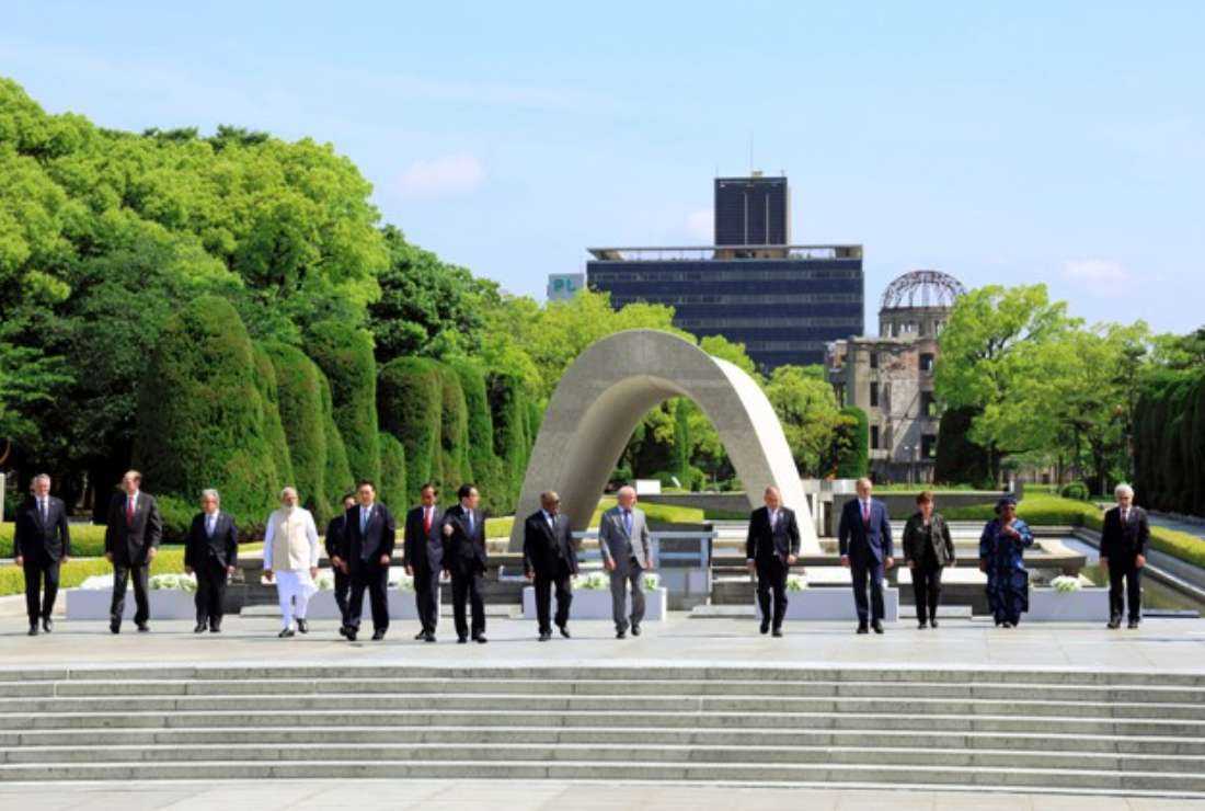 World leaders pose for a photograph during a wreath-laying ceremony at the Peace Memorial Park in Hiroshima on May 21 on the sidelines of the G7 Summit Leaders' Meeting