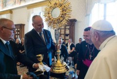 Adore Jesus' real presence in the Eucharist, pope says