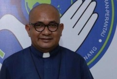 Spy drops defamation suit against Indonesian priest