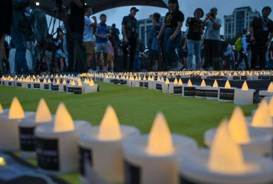 A candlelight vigil was held in Taiwan's capital to remember the victims of Tiananmen Square massacre of 1989 on June 4, while commemorations were banned in Hong Kong