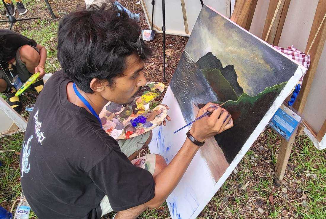 A painter takes part in the music and cultural festival on Atauro Island, Timor-Leste, which runs from Nov. 21-24