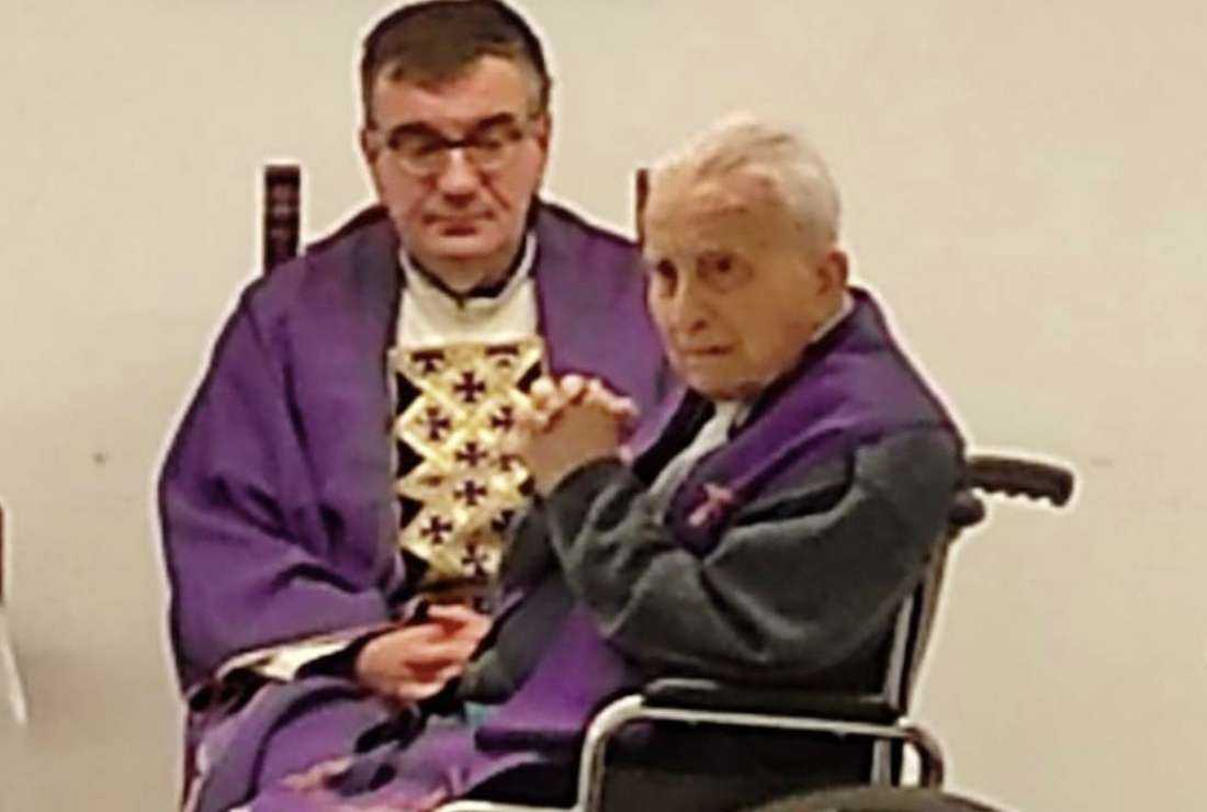 Father Angelo S. Lazzarotto, 97, of the Pontifical Institute for Foreign Missions (PIME) sits (in a wheelchair) with his confer Father Gianni Criveller on Dec. 22 at the Blessed Giovanni Mazzucconi community in Lecco as Lazzarotto marked the 75th anniversary of his priestly ordination. Both priests were missionaries in China