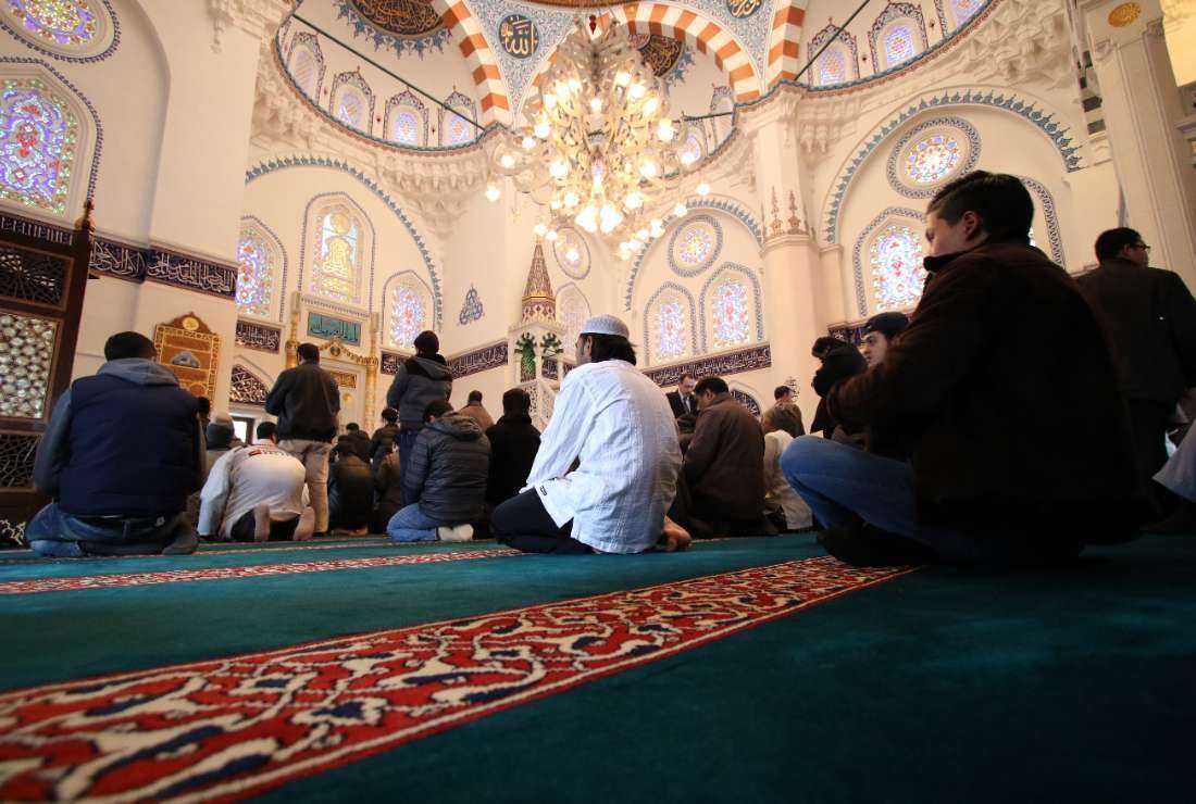 Muslim residents in Japan gather for a Friday service in Japan's largest mosque, the Tokyo Camii (mosque), in Tokyo on Jan. 30, 2015